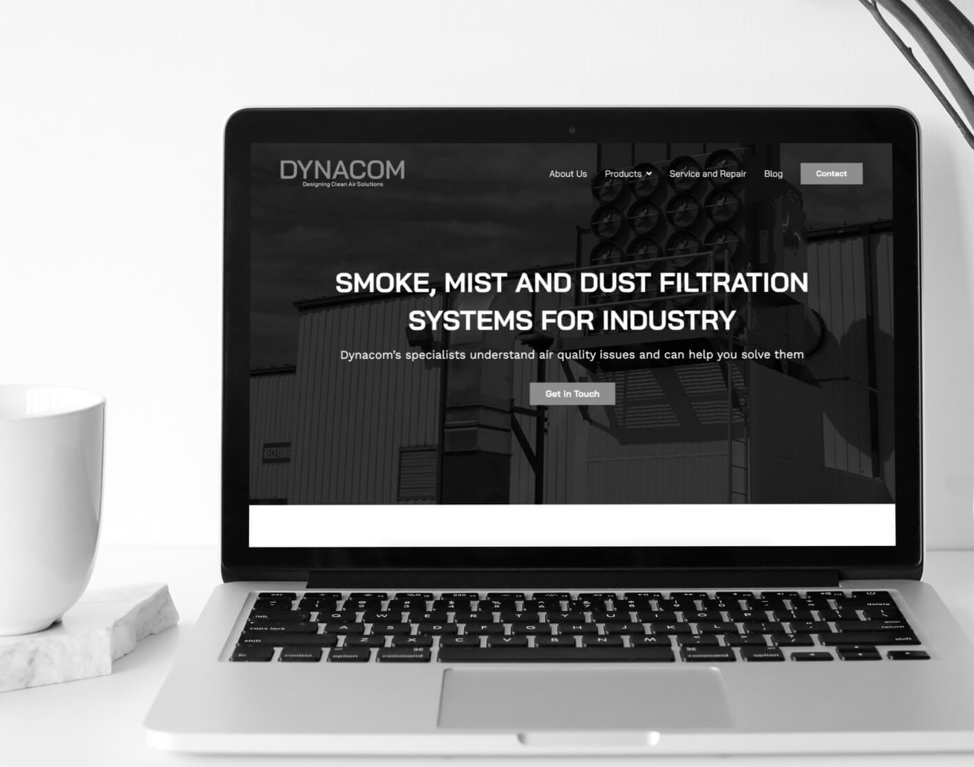 Dynacom website homepage on computer screen